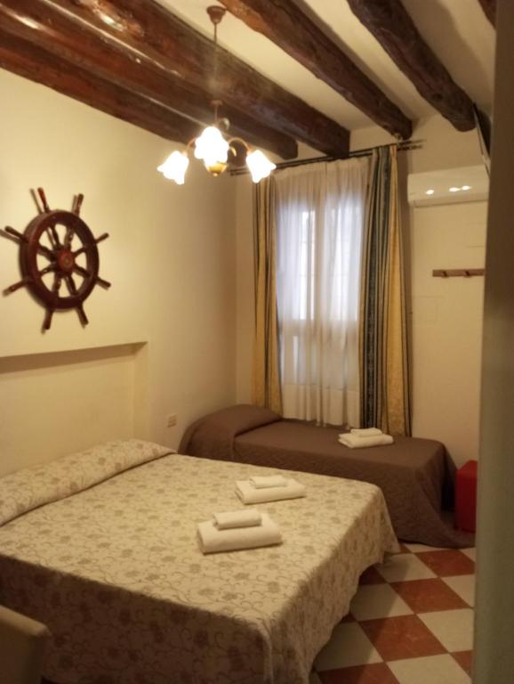 Postel nebo postele na pokoji v ubytování Hotel Henry