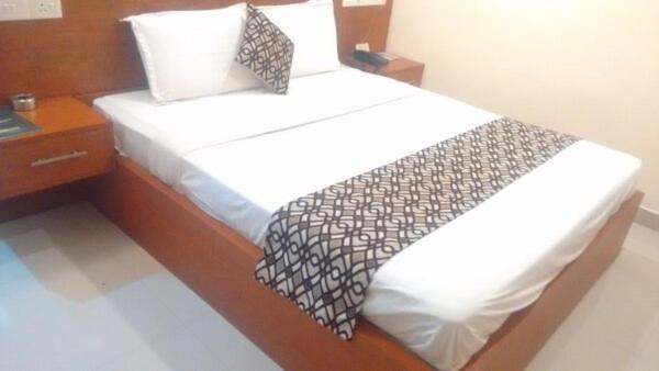 Voodi või voodid majutusasutuse Hotel Sasthapuri toas