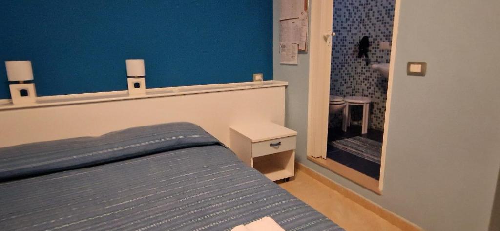 Postel nebo postele na pokoji v ubytování B&B Casa Mia