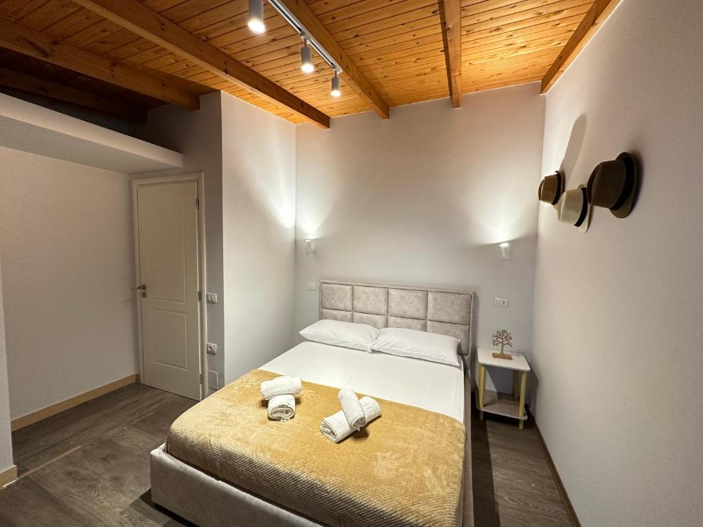 Postel nebo postele na pokoji v ubytování Anel Suites