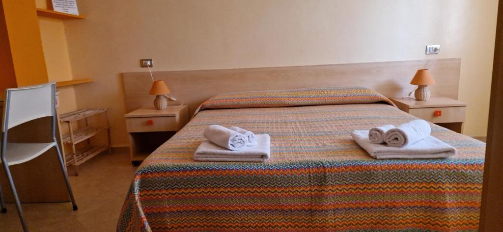 Postel nebo postele na pokoji v ubytování B&B Casa Mia