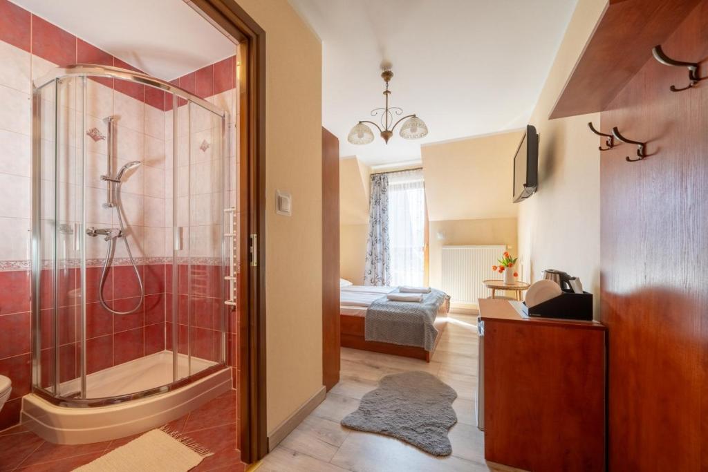 Posteľ alebo postele v izbe v ubytovaní Willa u Anusia Jacuzzi & Sauna