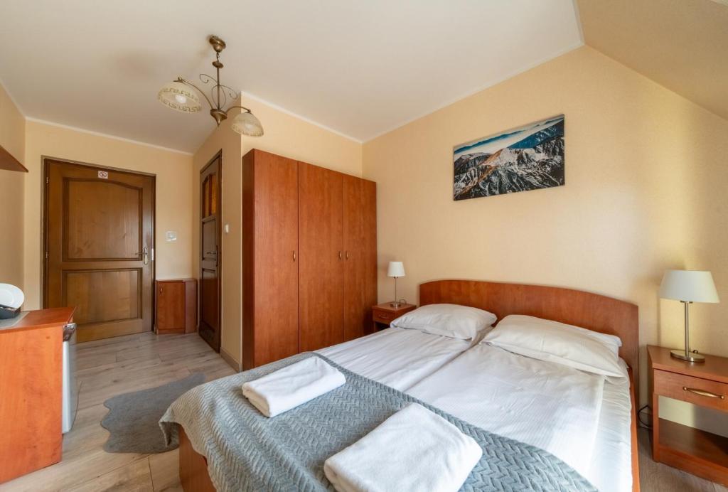 Posteľ alebo postele v izbe v ubytovaní Willa u Anusia Jacuzzi & Sauna