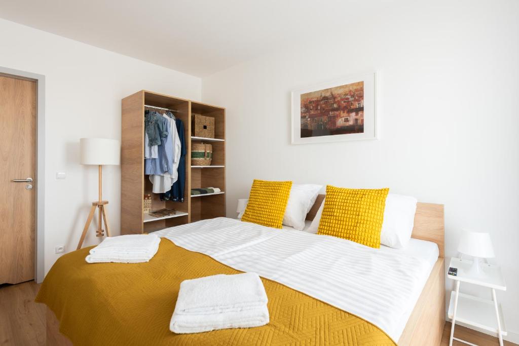 Postel nebo postele na pokoji v ubytování Libero Apartments