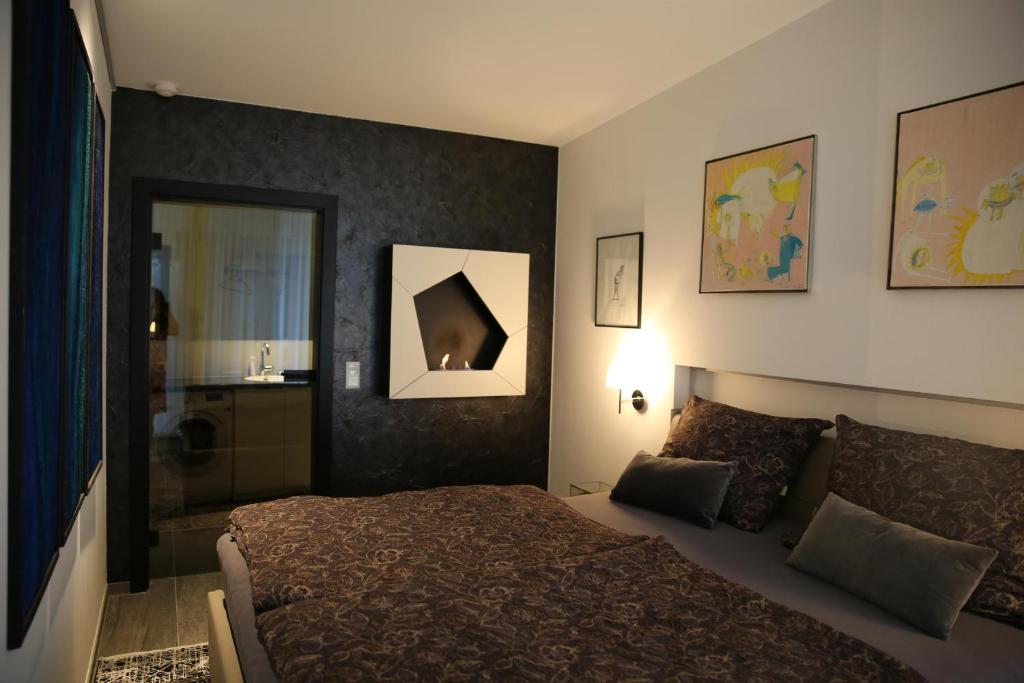Postel nebo postele na pokoji v ubytování Apartment SunBox