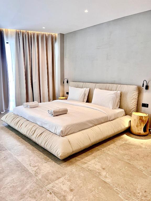 Letto o letti in una camera di Andon Lapa Hotel & Spa