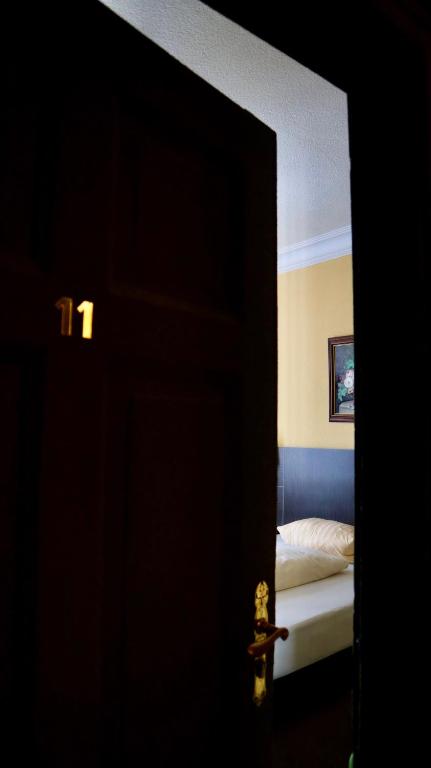 Postel nebo postele na pokoji v ubytování Hotel Villa Glas