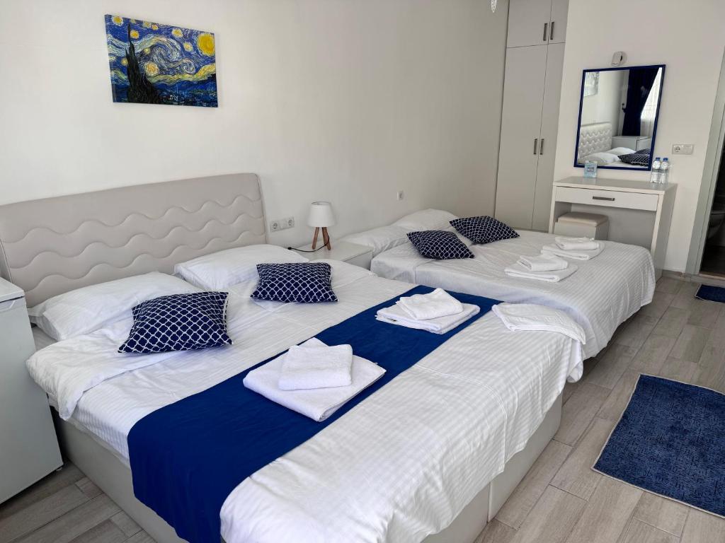 Postel nebo postele na pokoji v ubytování White and Blue Bodrum