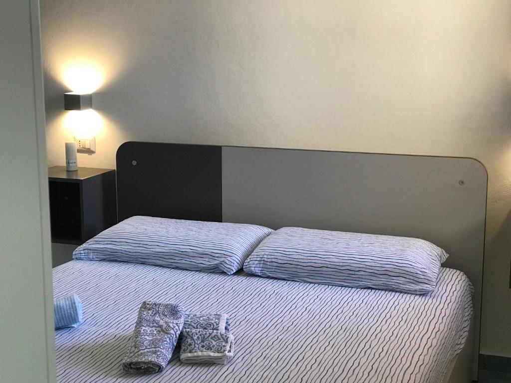 Кровать или кровати в номере Pelosa - Capo Falcone Excellent Apartment
