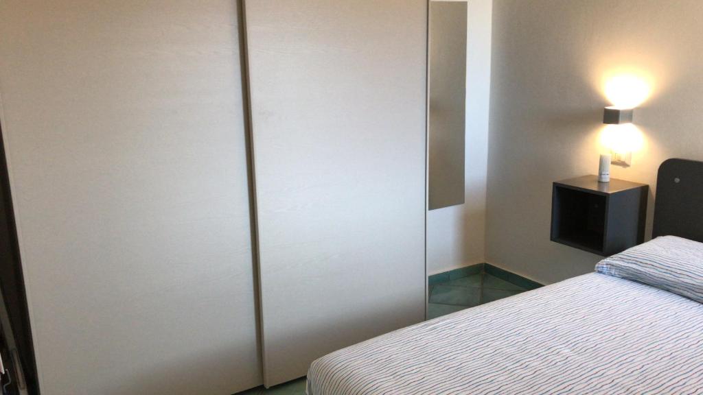 Кровать или кровати в номере Pelosa - Capo Falcone Excellent Apartment