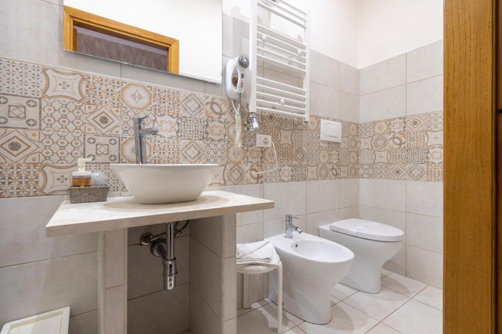 Koupelna v ubytování Hotel Bagliori