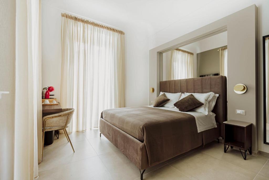 Postel nebo postele na pokoji v ubytování Le Grazie Relais & Spa
