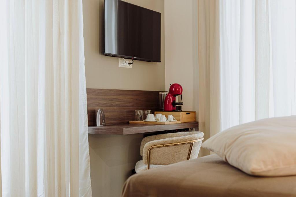 Postel nebo postele na pokoji v ubytování Le Grazie Relais & Spa