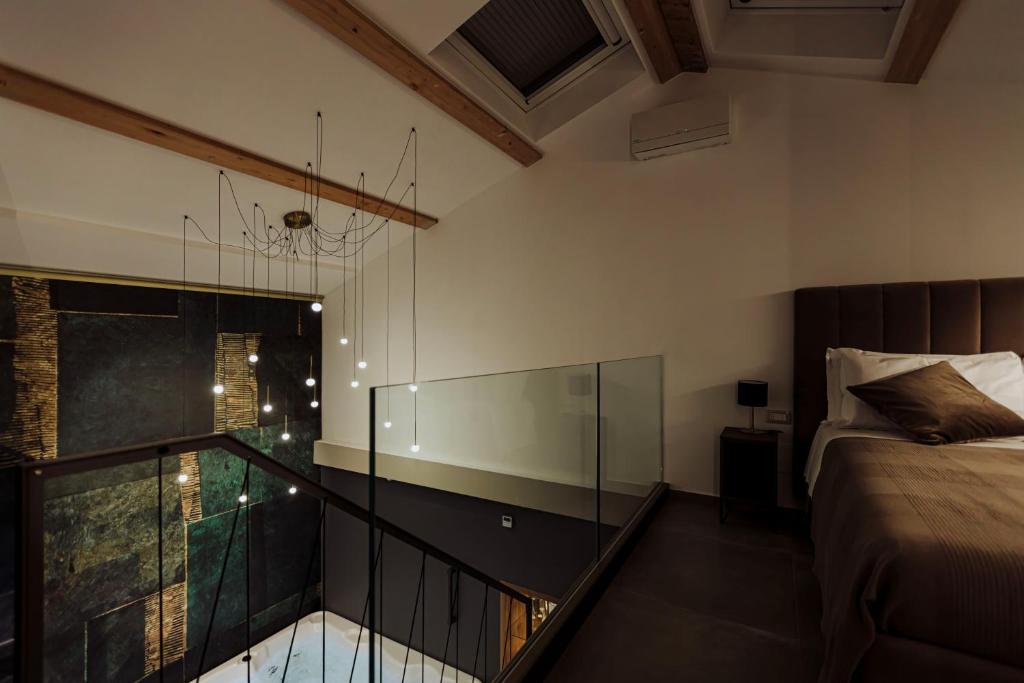 Postel nebo postele na pokoji v ubytování Le Grazie Relais & Spa