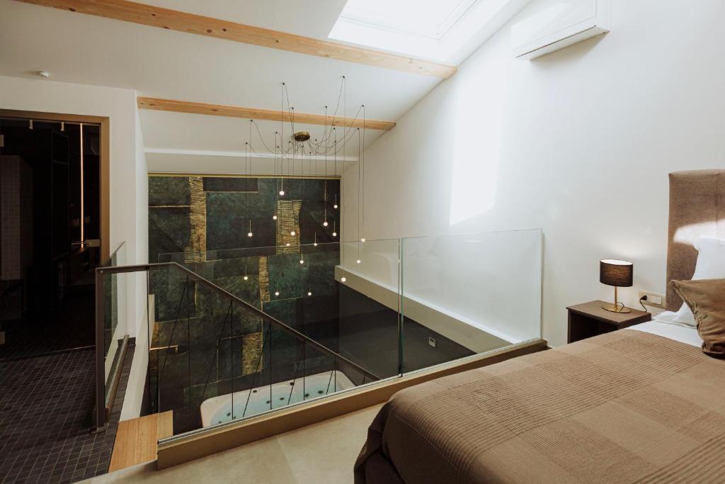 Postel nebo postele na pokoji v ubytování Le Grazie Relais & Spa