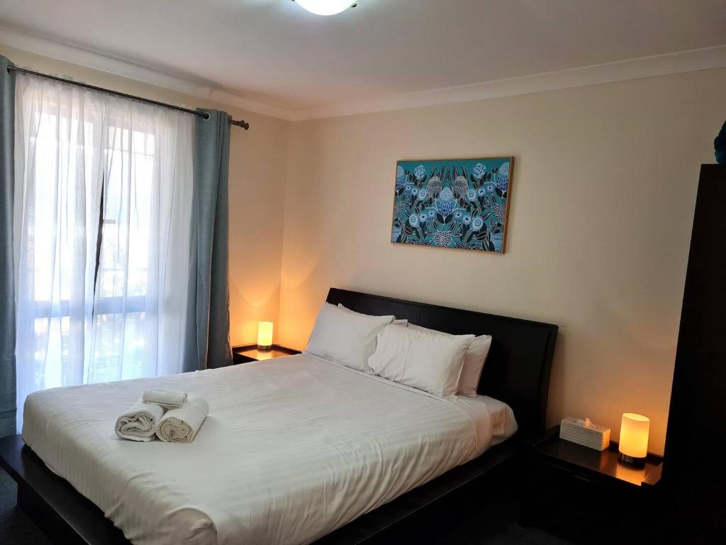 Tempat tidur dalam kamar di Seashore Memories - Sleeps 3