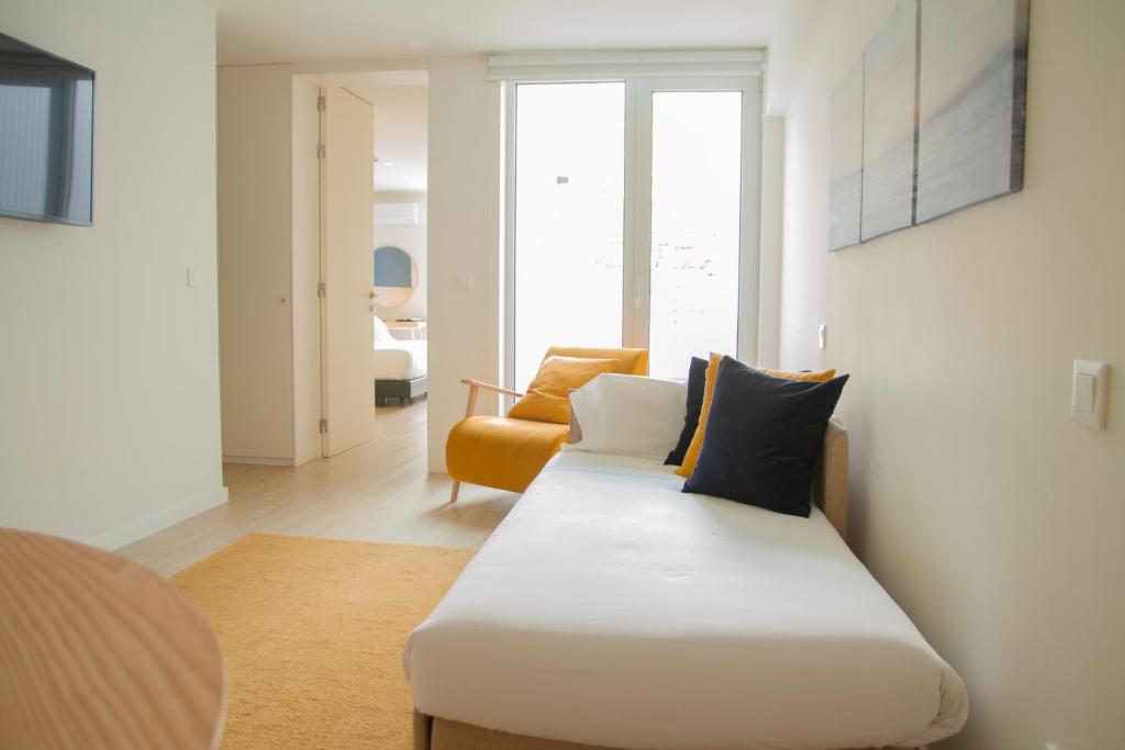 Posezení v ubytování room Select Porto Suites