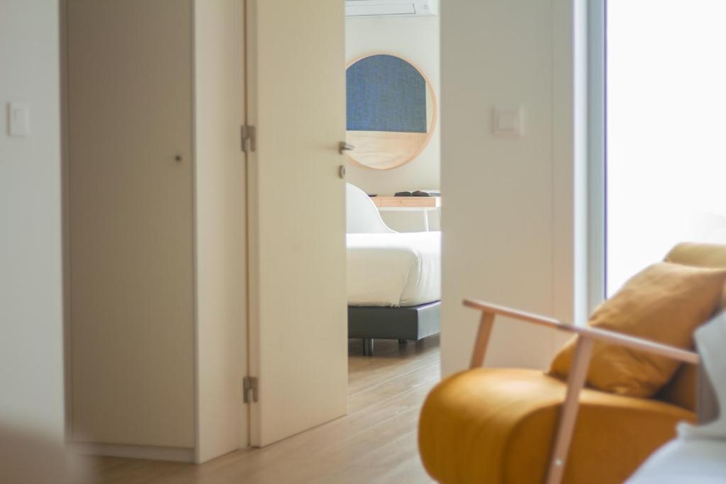 Posezení v ubytování room Select Porto Suites