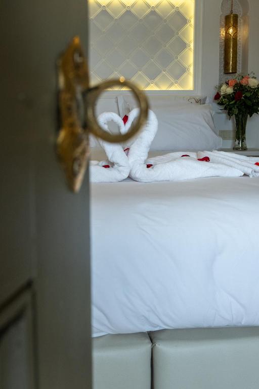 Postel nebo postele na pokoji v ubytování Luxe Nomade Marrakech & Spa