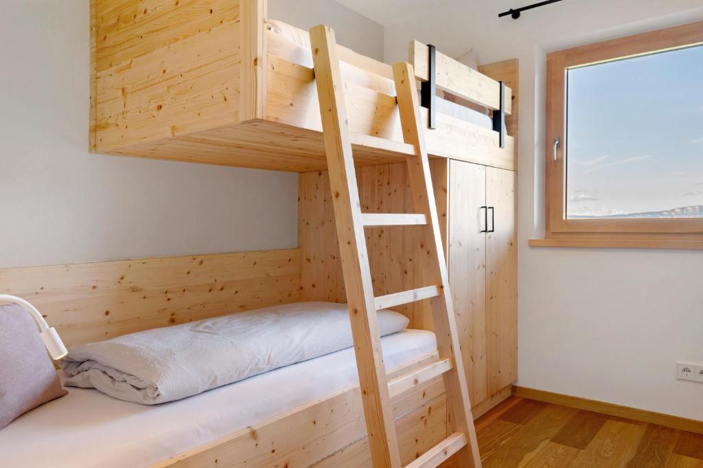 Postel nebo postele na pokoji v ubytování Ebnerhof