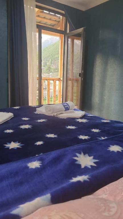 Postel nebo postele na pokoji v ubytování Guest House Guli