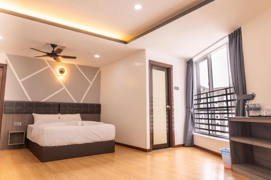 Rúm í herbergi á Sunrisestay
