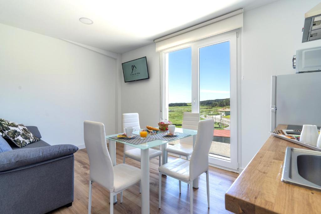 TV a/nebo společenská místnost v ubytování Hospedium Apartamentos Galitrips A Casa Da Reina