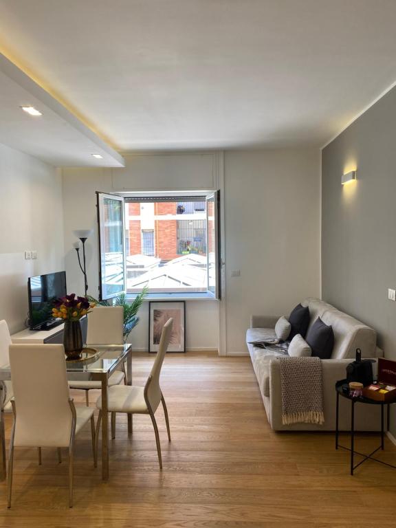 Posedenie v ubytovaní Gramsci 2 - Cozy Apartment near Sempione Park!
