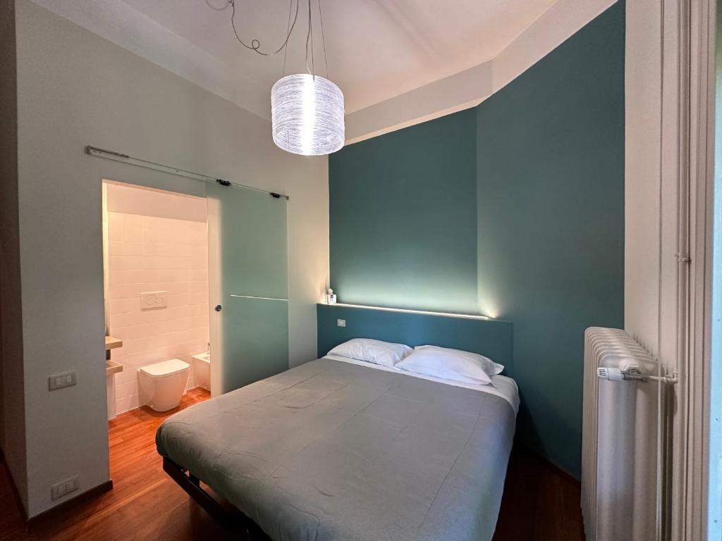 Кровать или кровати в номере Room & Breakfast D'Annunzio