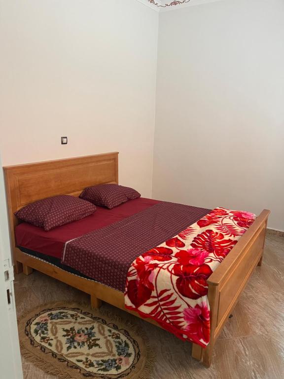 Кровать или кровати в номере Amine