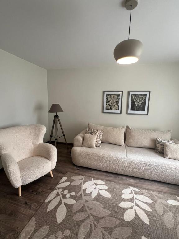 Posezení v ubytování Une-max