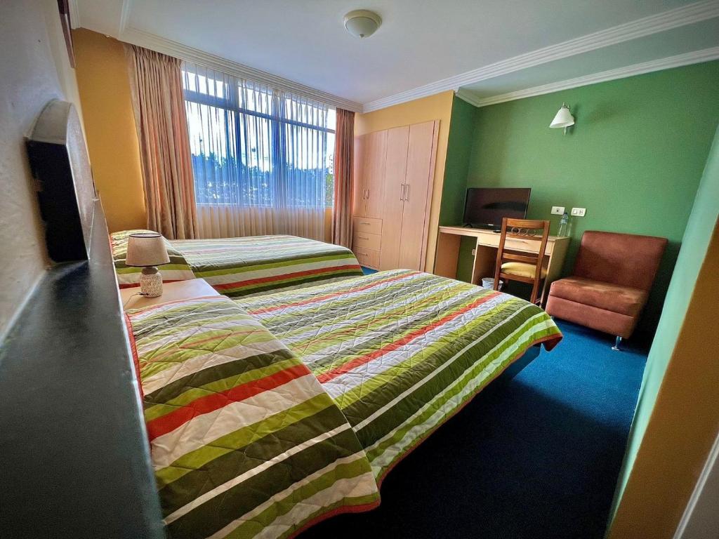 Postel nebo postele na pokoji v ubytování Casa Carrión