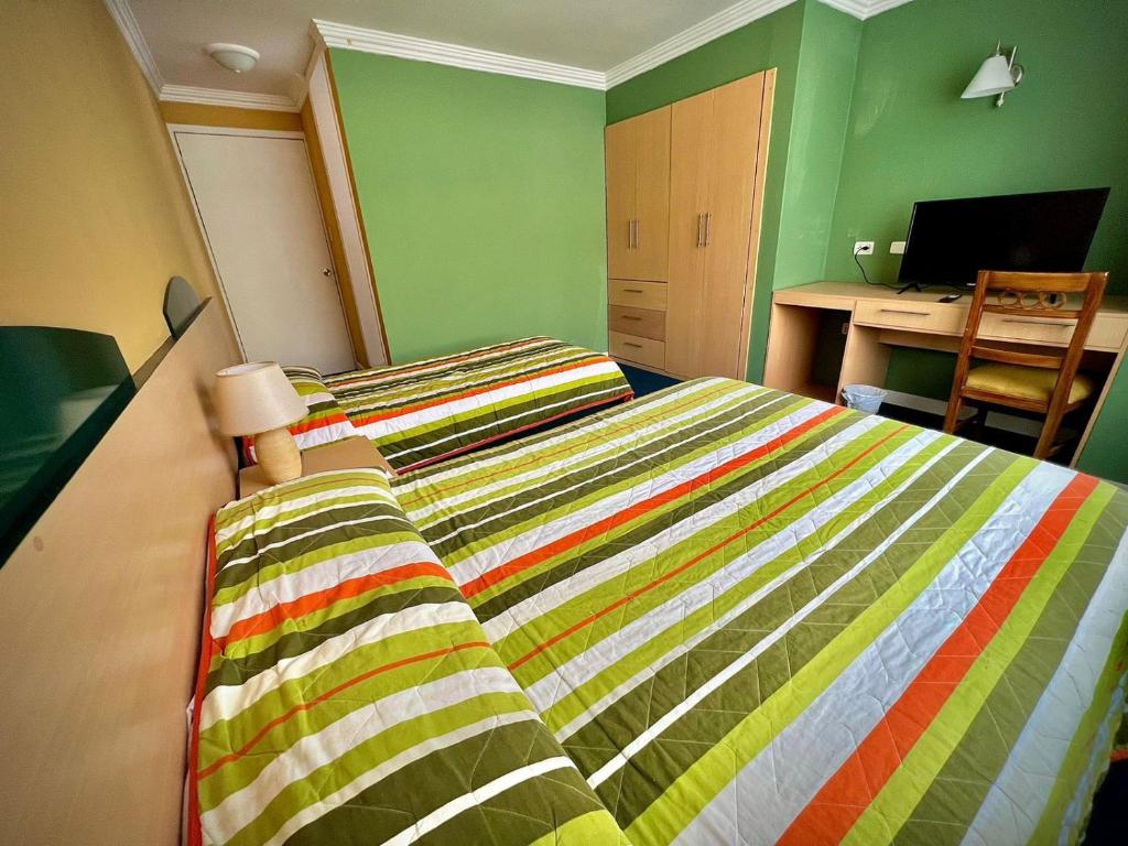 Postel nebo postele na pokoji v ubytování Casa Carrión