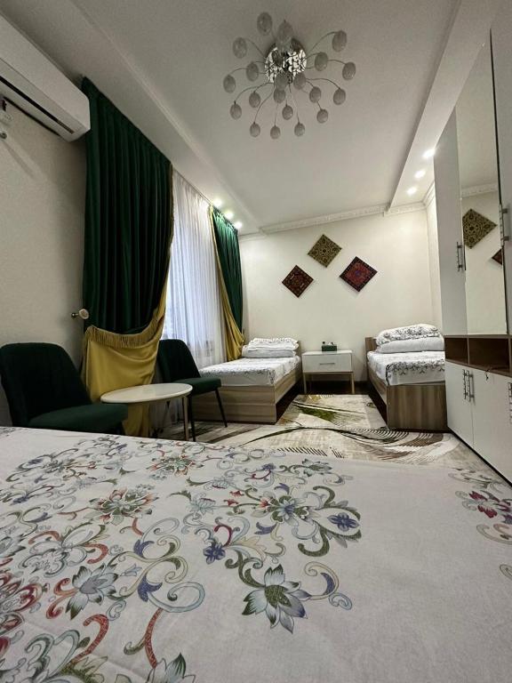 Postel nebo postele na pokoji v ubytování Sultan Saray