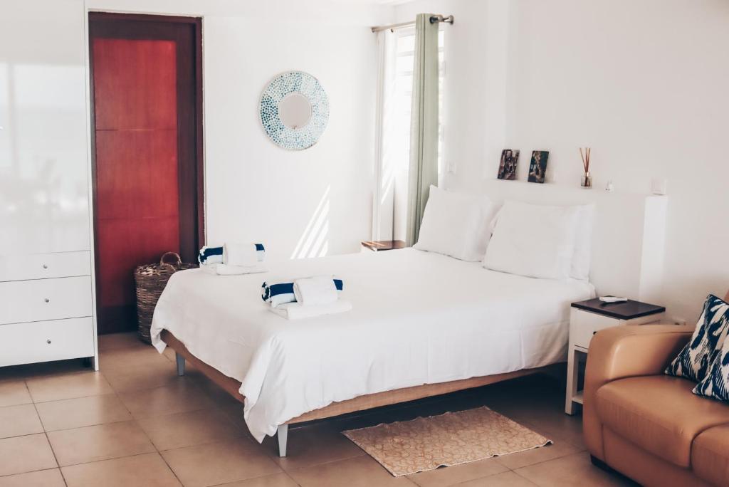 Postel nebo postele na pokoji v ubytování Joliebeachsxm