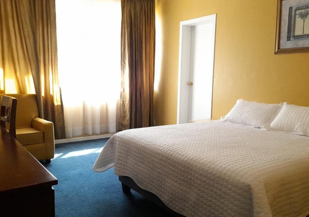 Postel nebo postele na pokoji v ubytování Casa Carrión