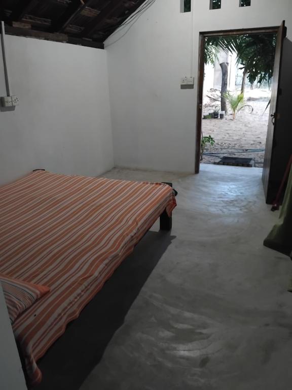 Postel nebo postele na pokoji v ubytování 20 House Villa