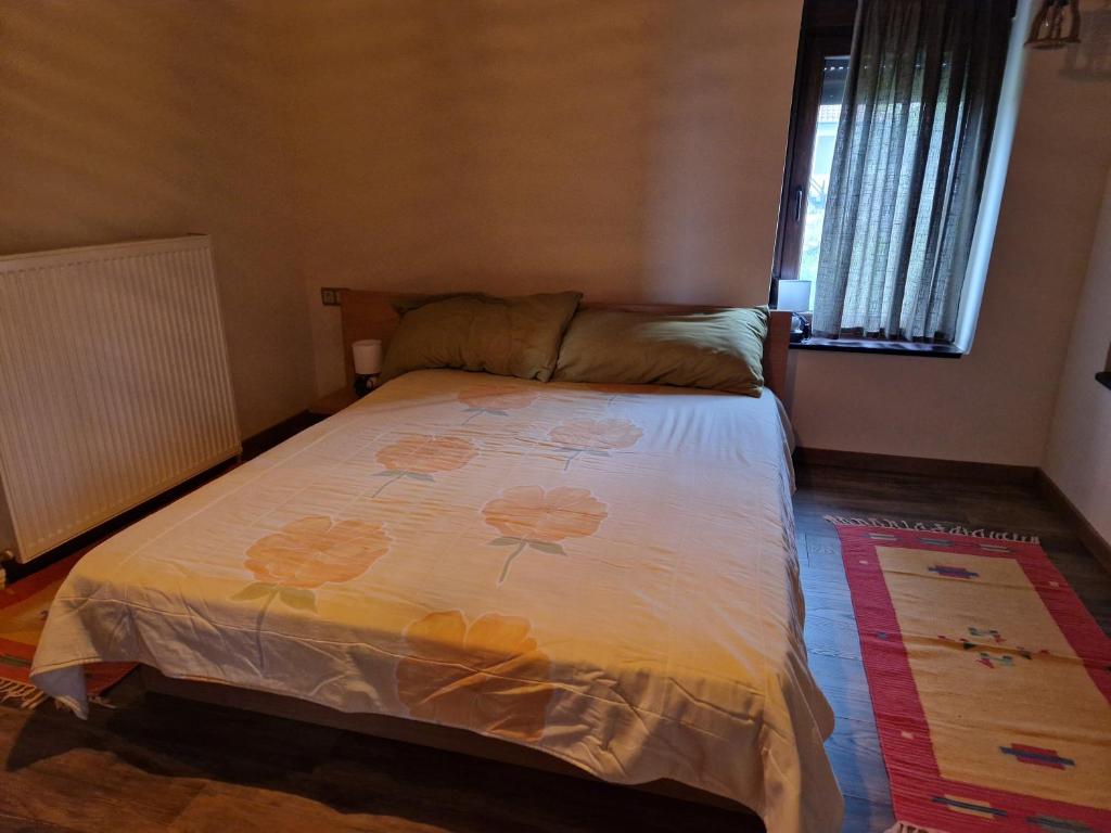 Postel nebo postele na pokoji v ubytování Sunflower Apartment