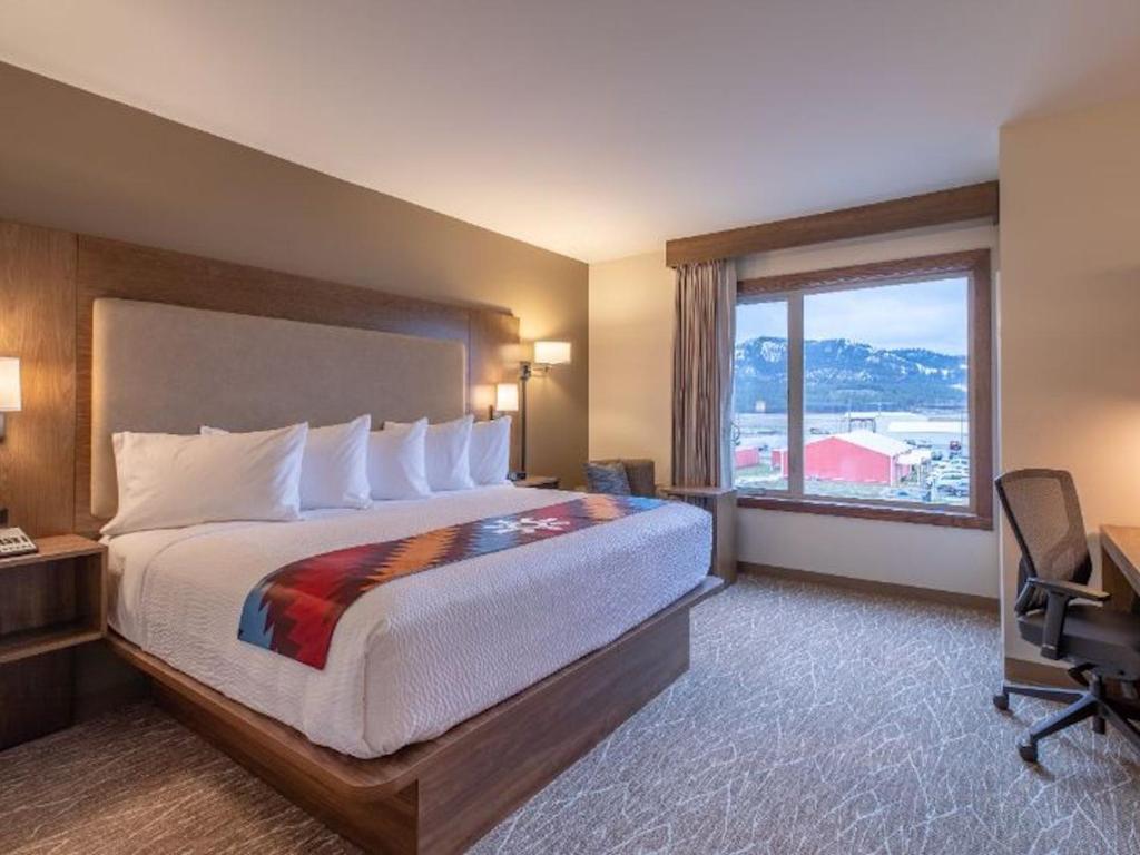 Postel nebo postele na pokoji v ubytování Mistequa Casino Hotel