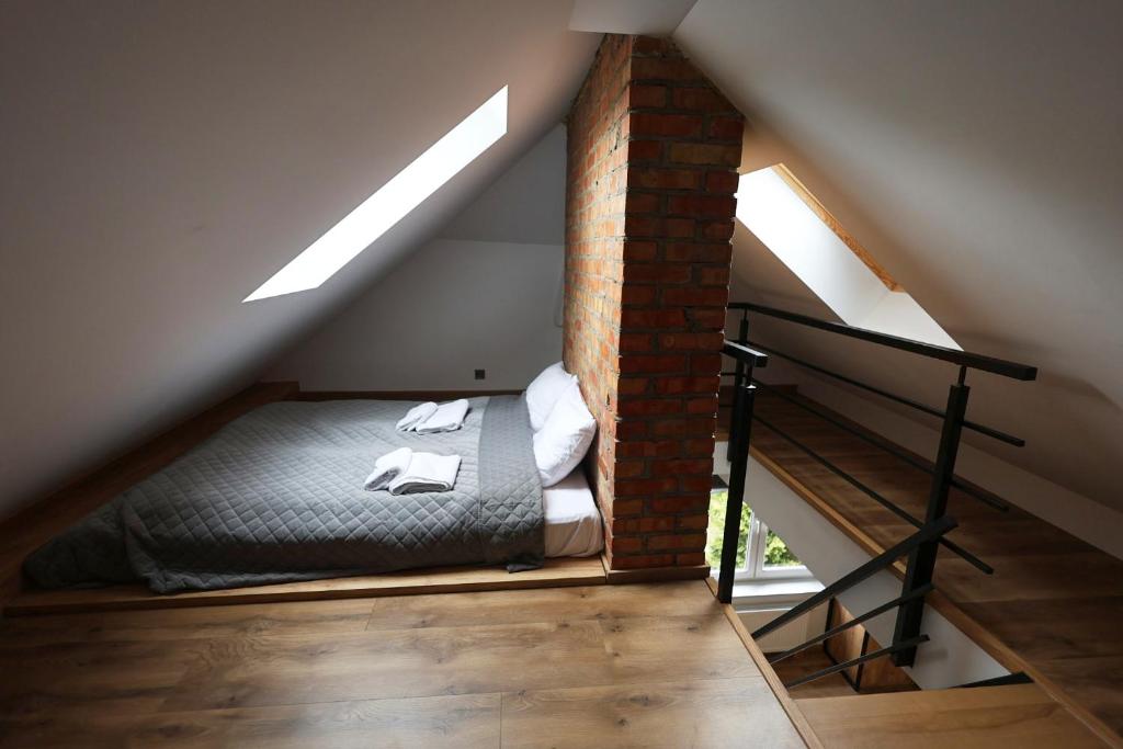 Postel nebo postele na pokoji v ubytování JAK MAKIEM ZASIAŁ