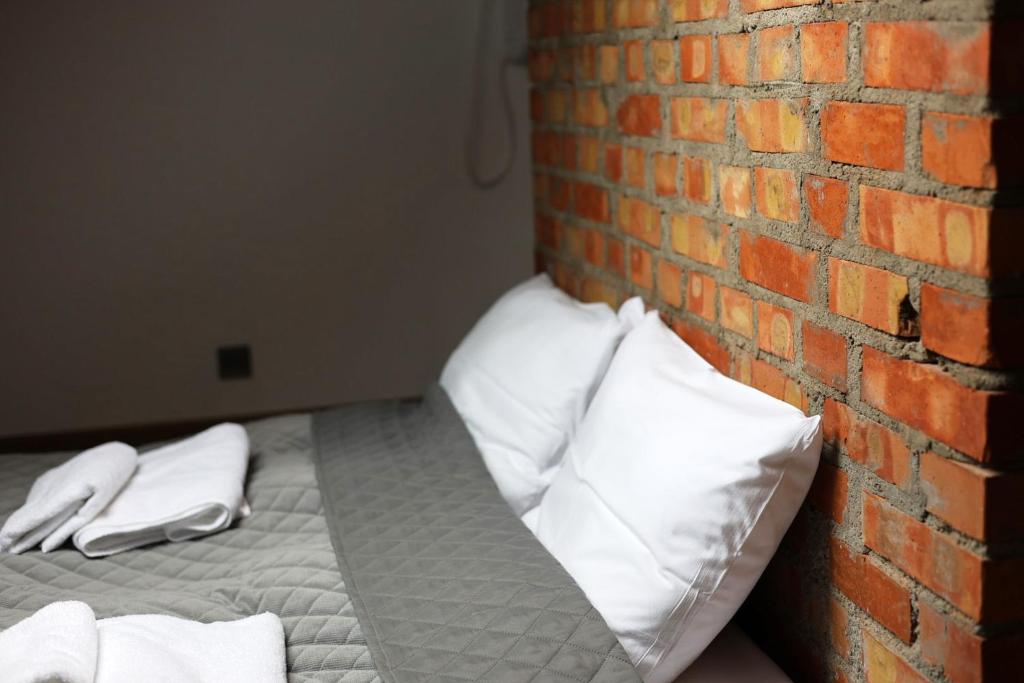 Postel nebo postele na pokoji v ubytování JAK MAKIEM ZASIAŁ