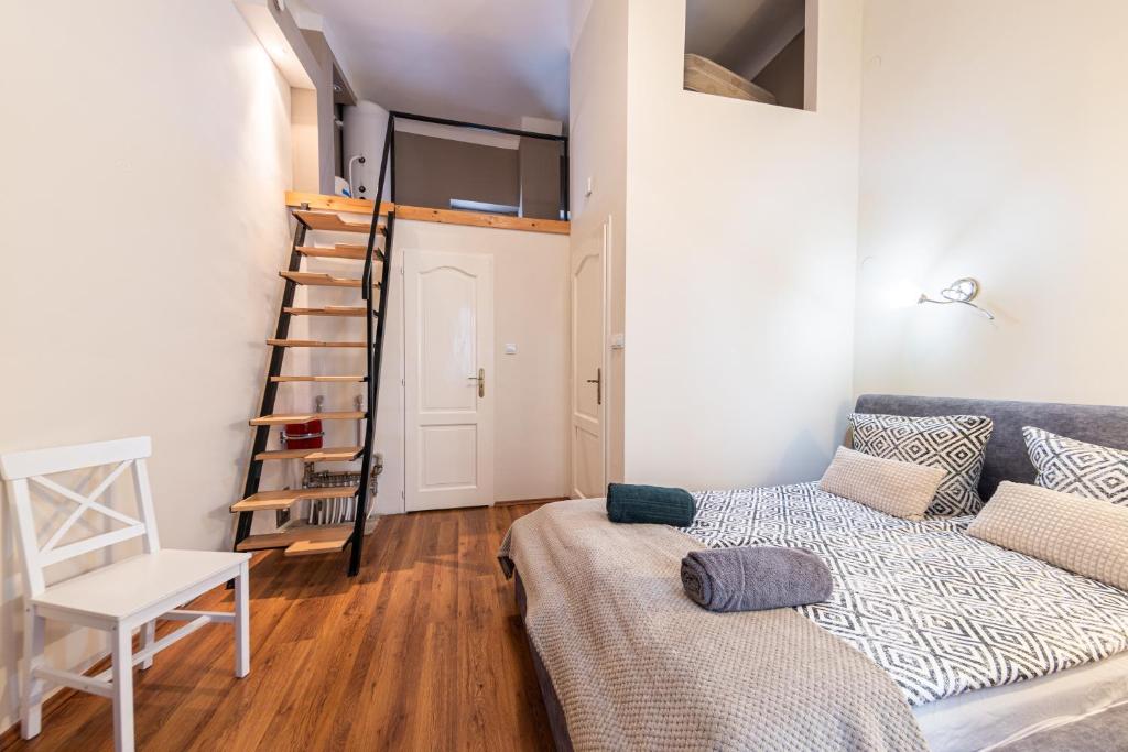 Postel nebo postele na pokoji v ubytování Urban Rooms