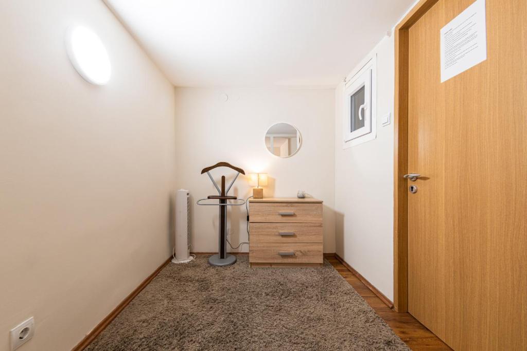 TV a/nebo společenská místnost v ubytování Urban Rooms