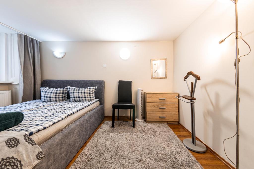 Postel nebo postele na pokoji v ubytování Urban Rooms