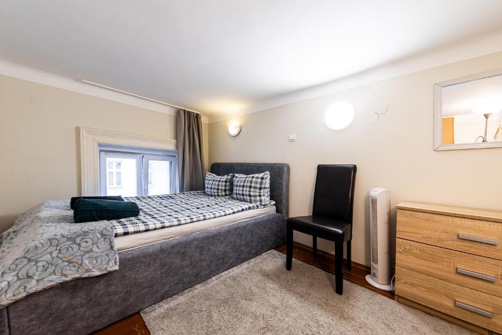 Postel nebo postele na pokoji v ubytování Urban Rooms