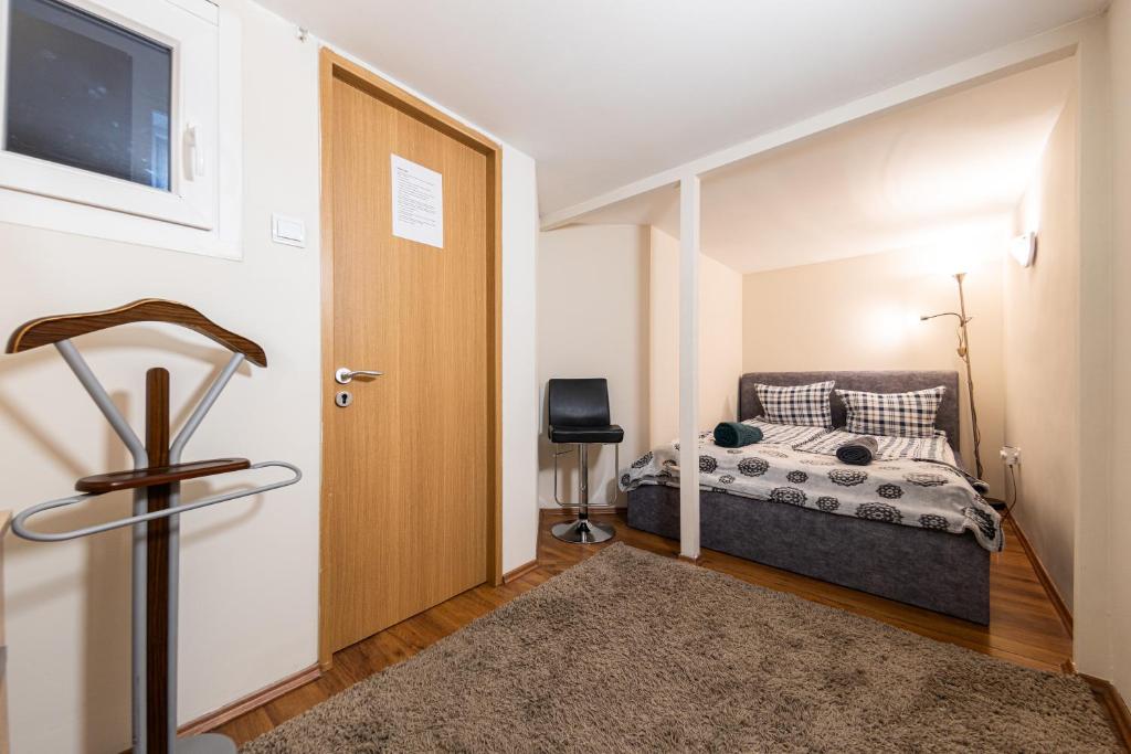 Postel nebo postele na pokoji v ubytování Urban Rooms