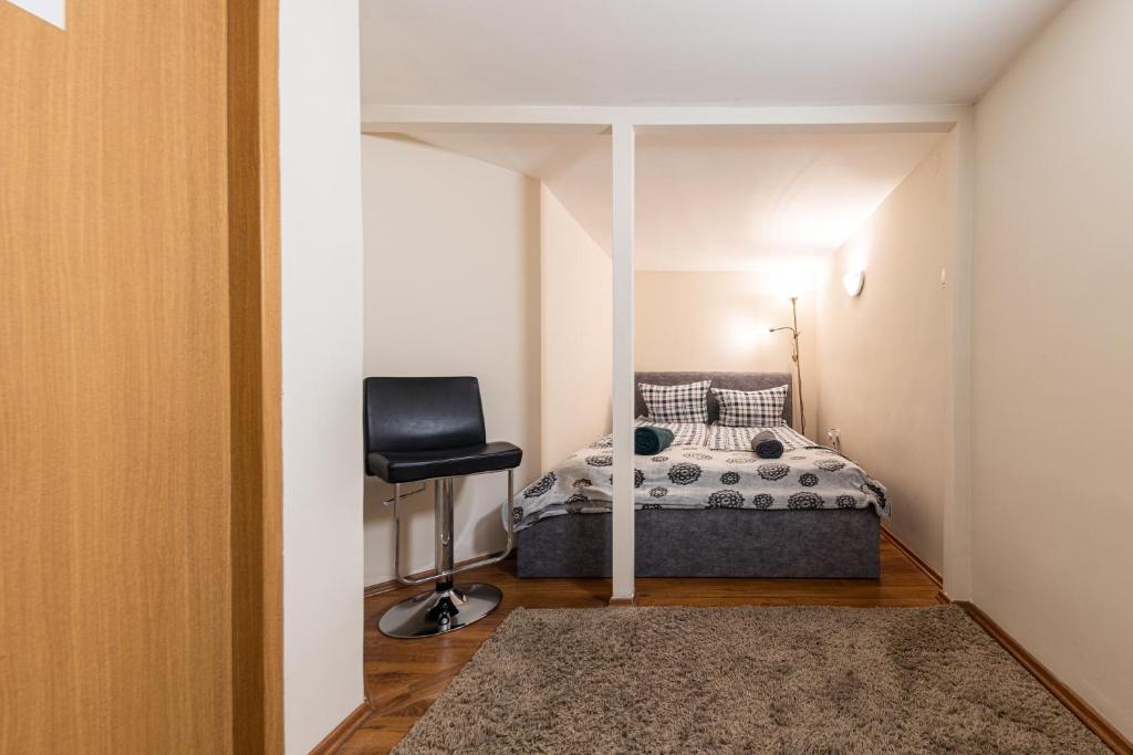 Postel nebo postele na pokoji v ubytování Urban Rooms