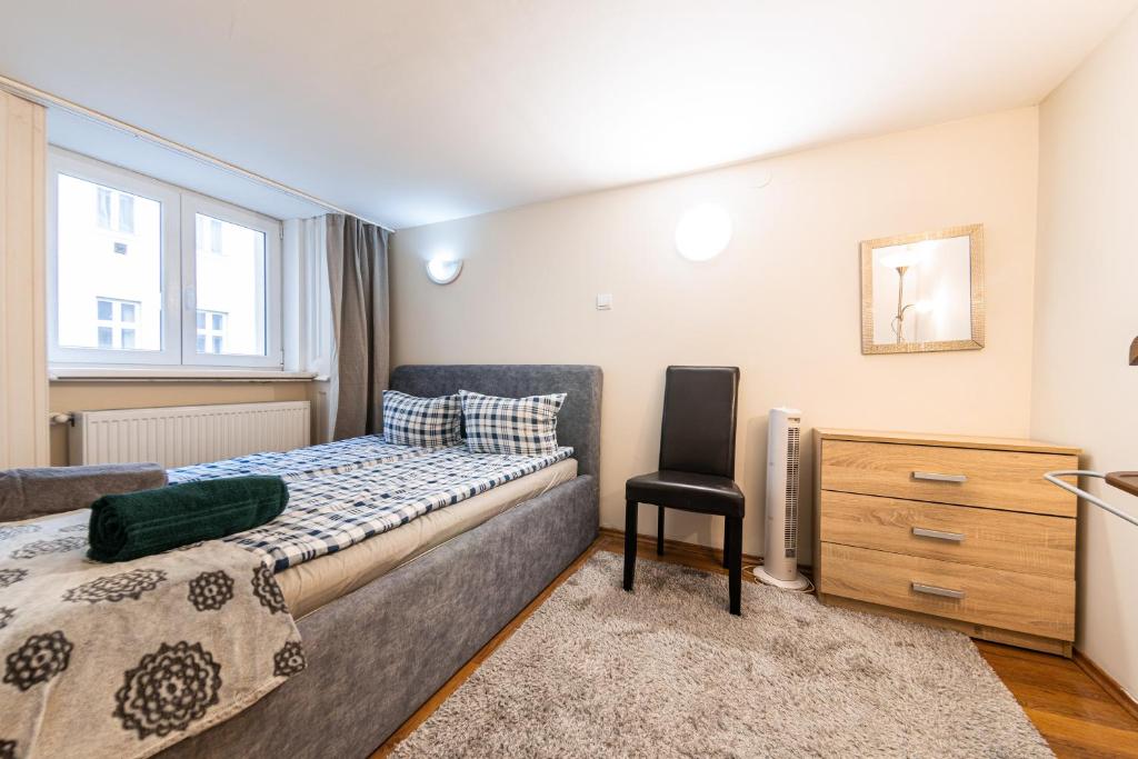 Postel nebo postele na pokoji v ubytování Urban Rooms