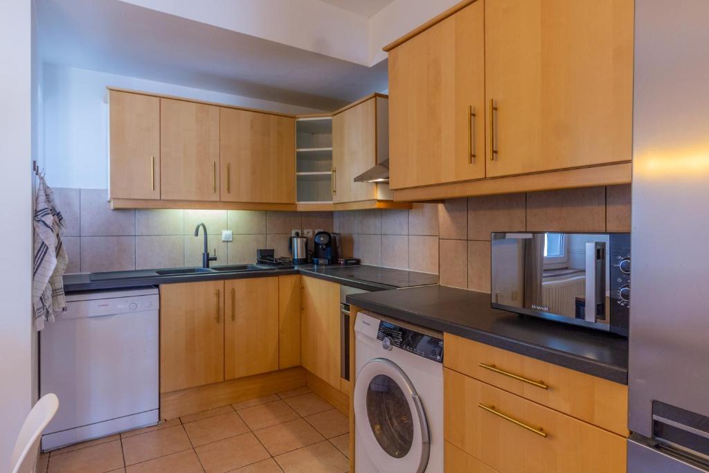 Kuchyň nebo kuchyňský kout v ubytování Appartement avec vue sur vignoble