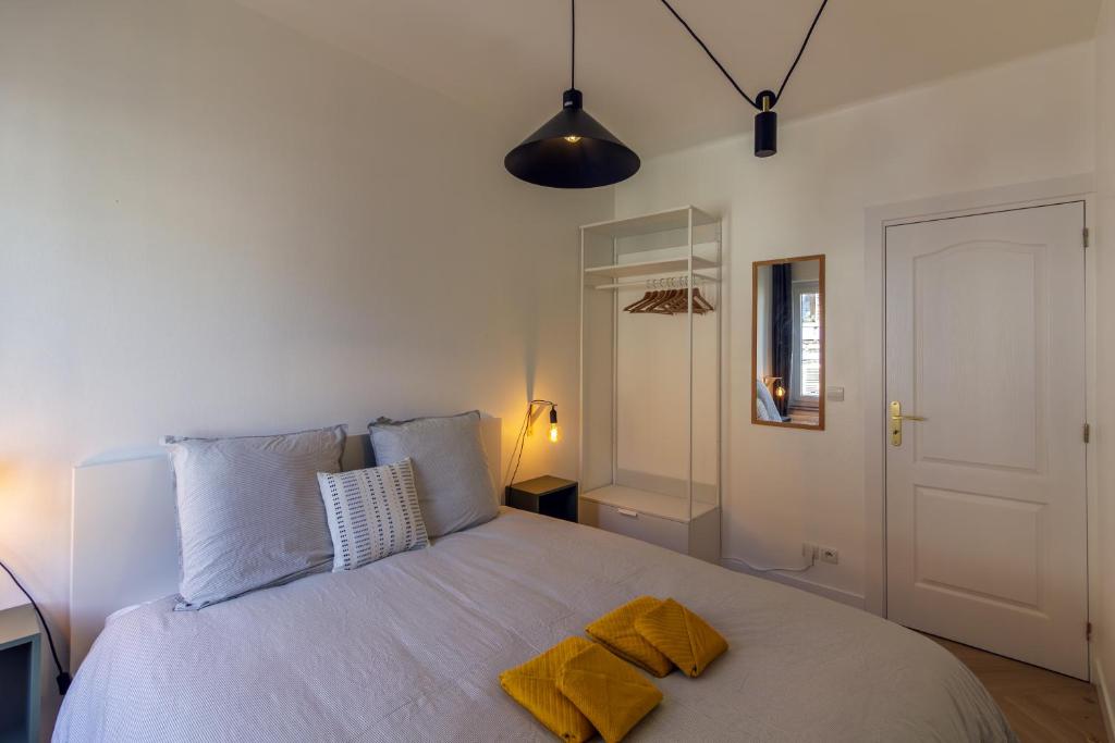 Postel nebo postele na pokoji v ubytování Appartement avec vue sur vignoble